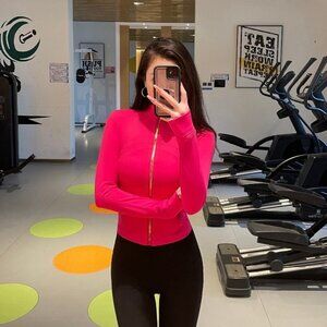 lulu yoga wear, define stand-up collar, short gold zip-up jacket. Lululemon